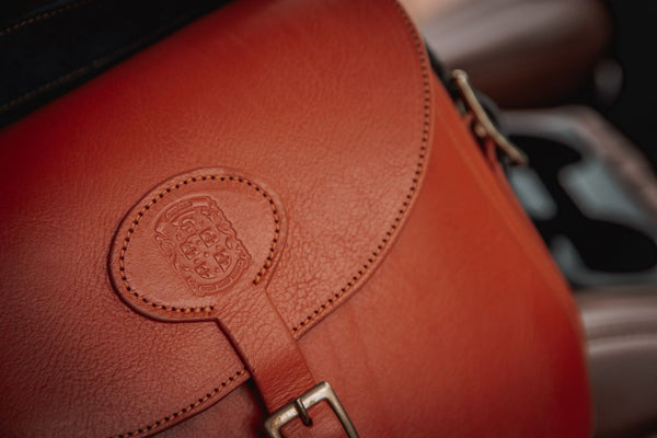 Coupland Leather handcrafted leather orange cartridge bag