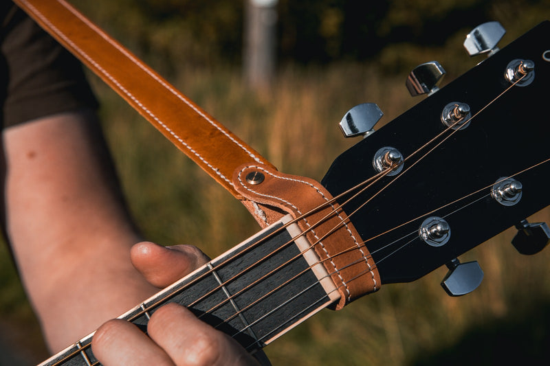 Leather acoustic guitar headstock tie