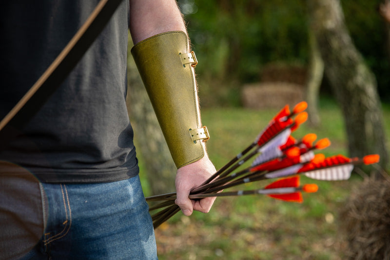 Adjustable leather archery bracer
