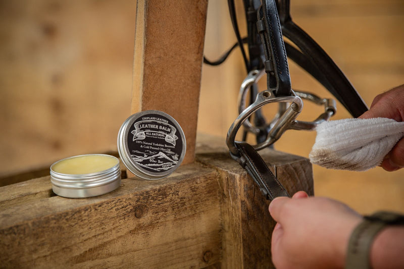 Artisan leather balm used on saddle straps for deep conditioning and care