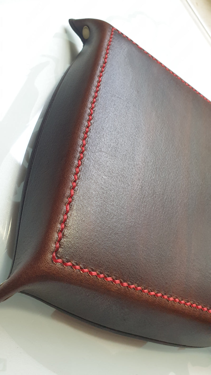 red stitching on valet tray