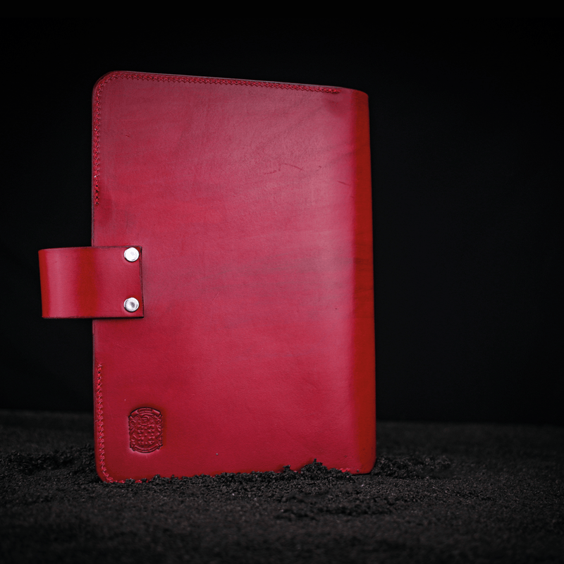 red leather bni branded A5 notebook cover closed with coupland crest