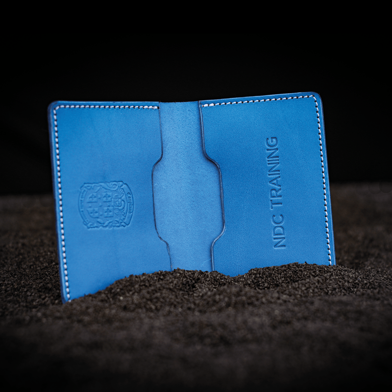 blue leather bi-fold business card wallet open with coupland crest and bespoke business name