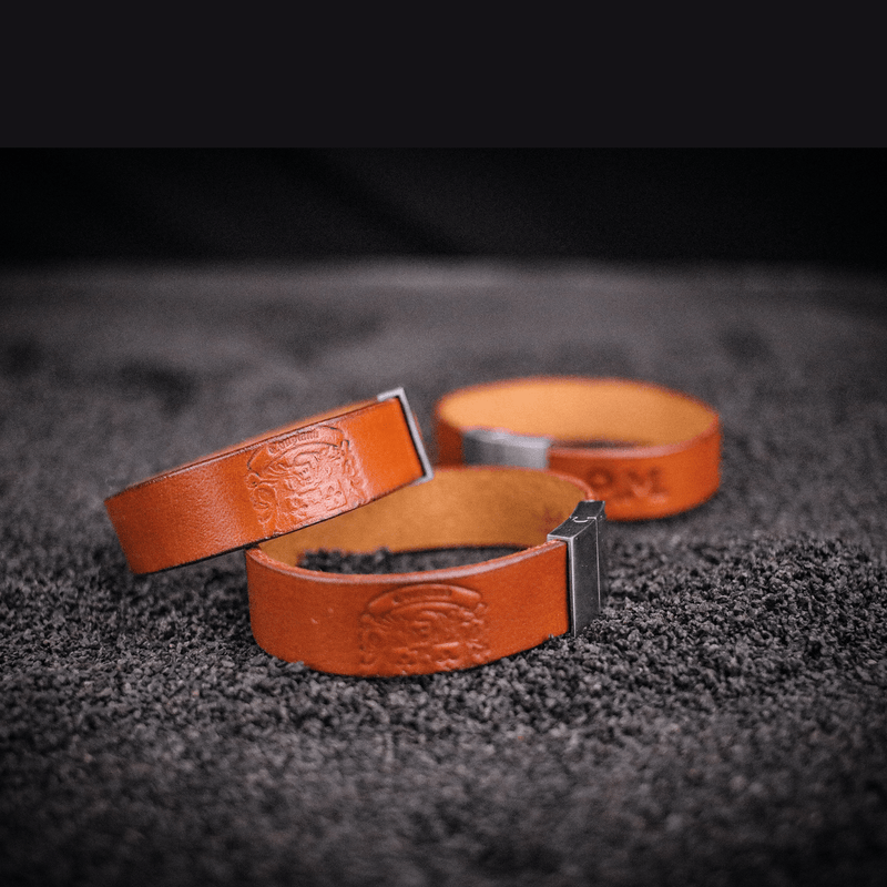 three light brown single wrap leather bracelets