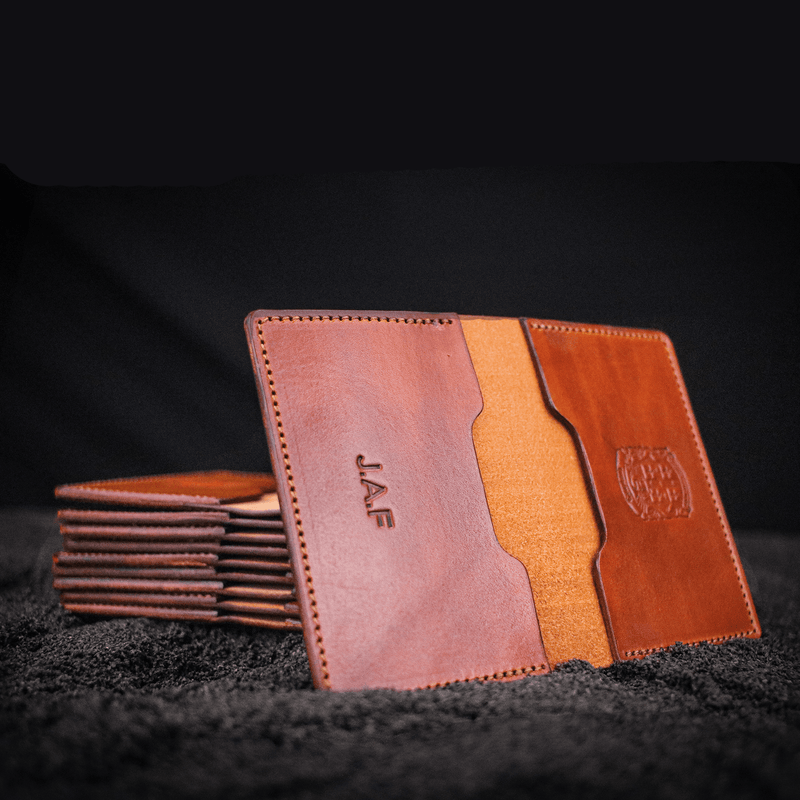 brown leather bi-fold business card wallet open with bespoke initials