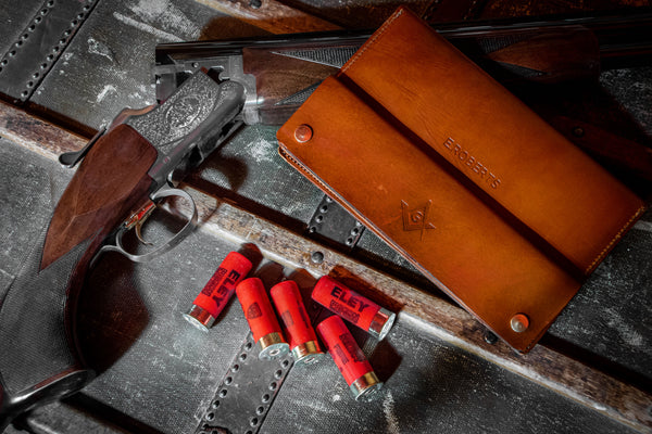 custom firearm certificate holder, shotgun and bullets