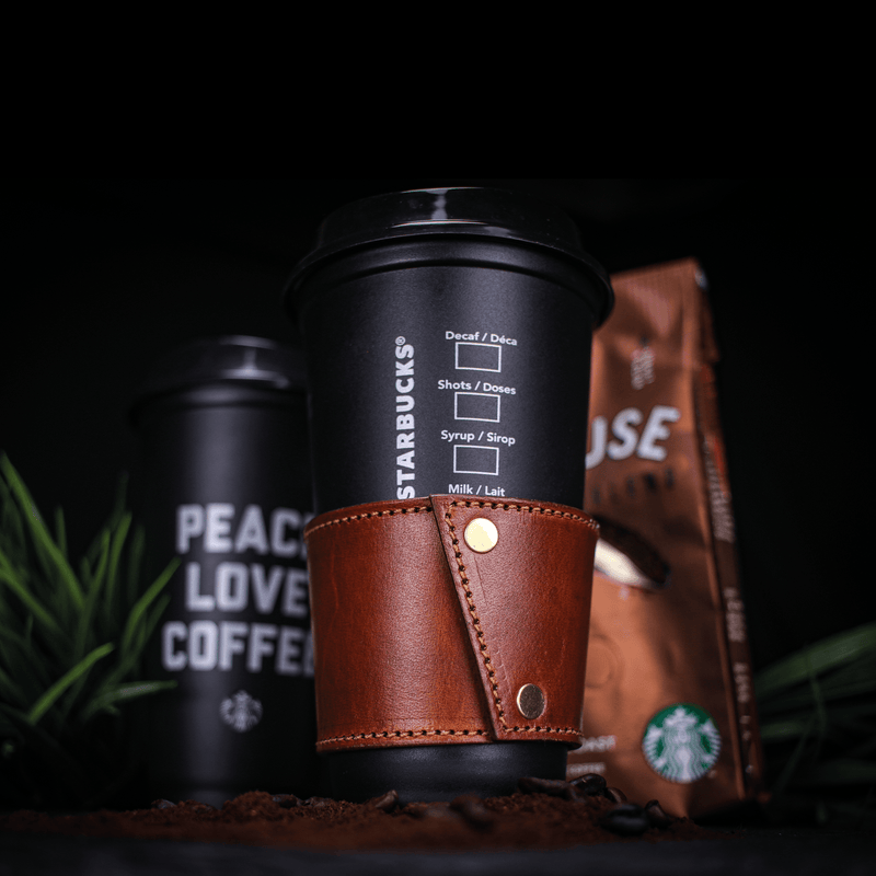 bespoke leather coffee cup sleeve on coffee cup close up