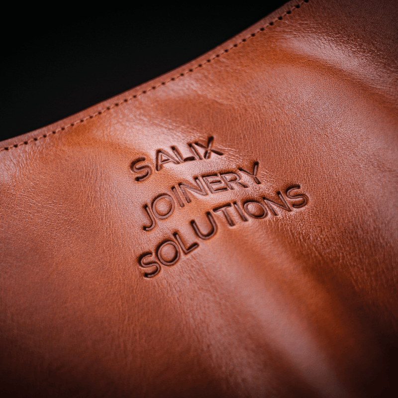 company branded leather chisel roll case close up