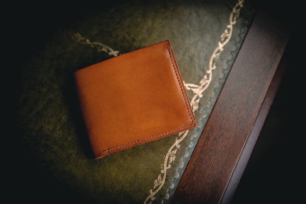 the AJ leather wallet closed in light brown