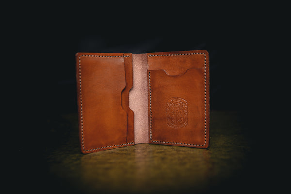 light brown mike leather wallet open with coupland crest