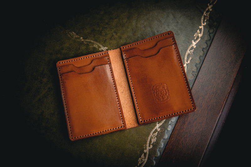 tan dan leather wallet open with coupland crest
