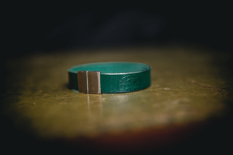 green single wrap leather bracelet with coupland crest