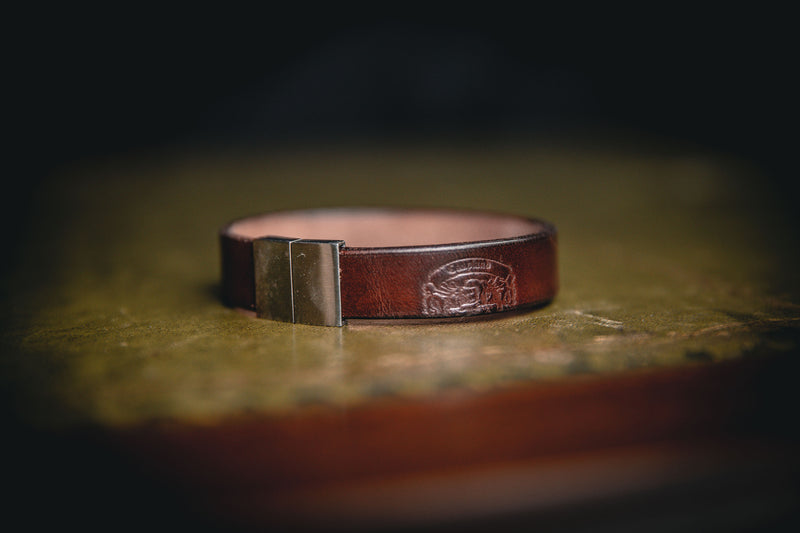 dark brown single wrap bracelet with coupland crest