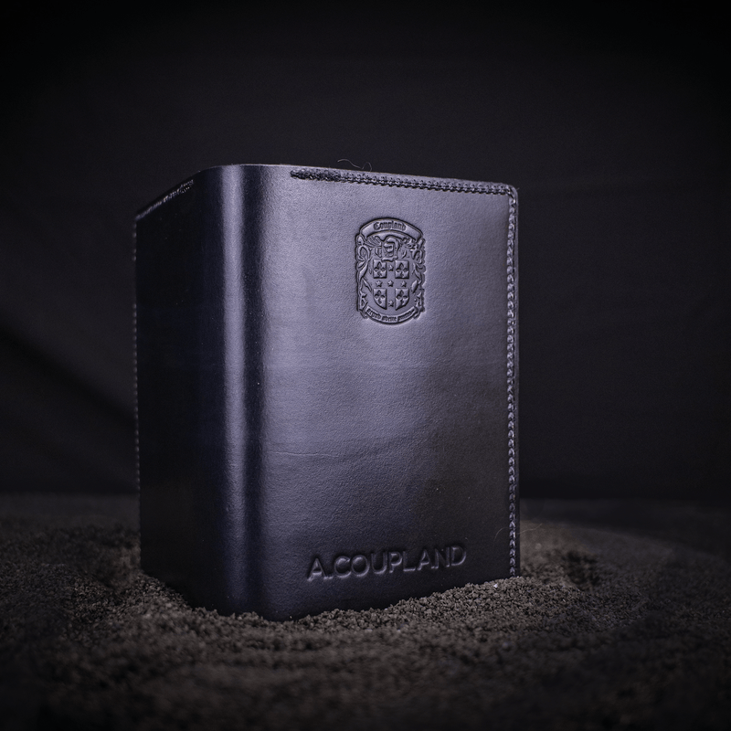 engraved black leather passport holder with coupland crest