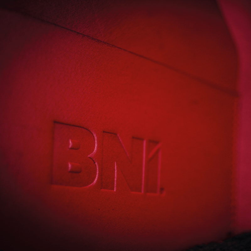red leather bni branded A5 notebook cover close up