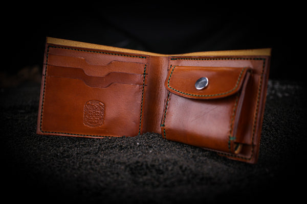 the Pete leather wallet open with coupland crest