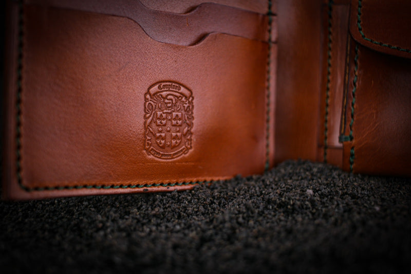 coupland crest close up on Pete leather wallet