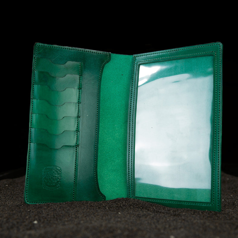 green leather firearms certificate and card holder