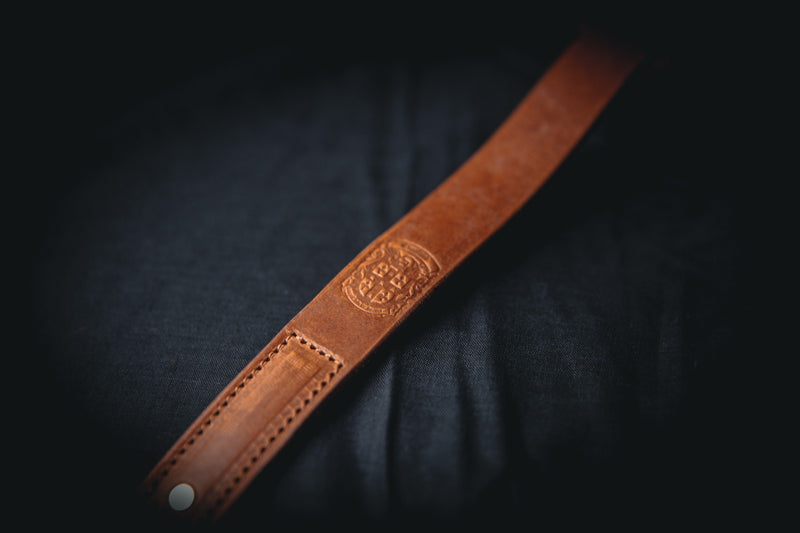 brown leather camera wrist strap with coupland crest