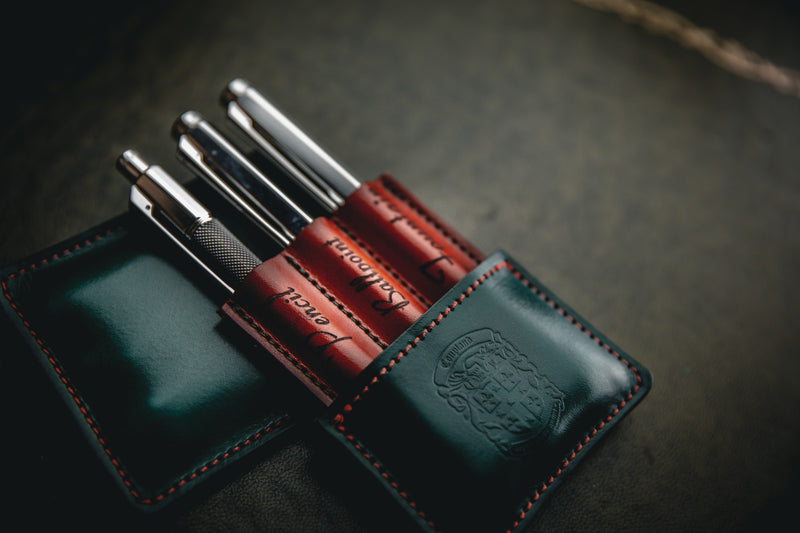 triple leather pen holder including pens and coupland crest
