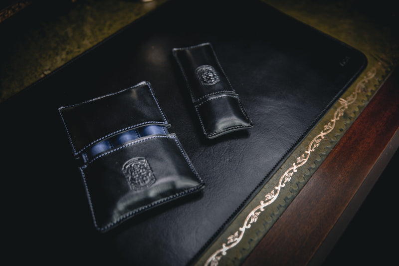 black leather desk mat with double and triple branded pen holder and coupland crests