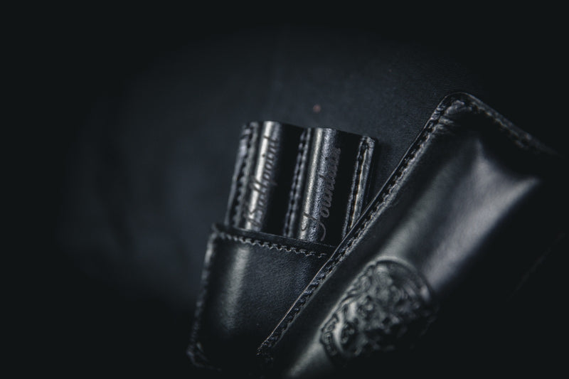 black leather double pen holder close up