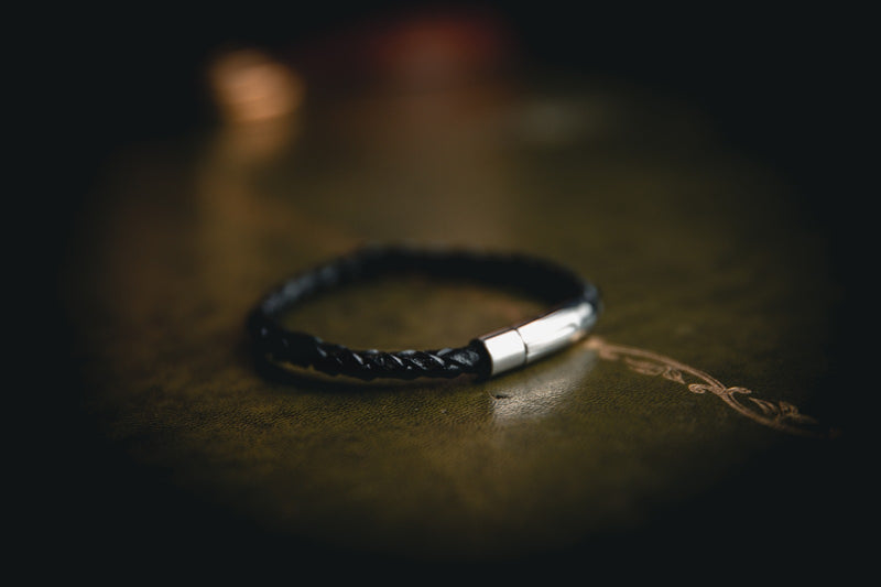 black braided leather bracelet with silver fastening