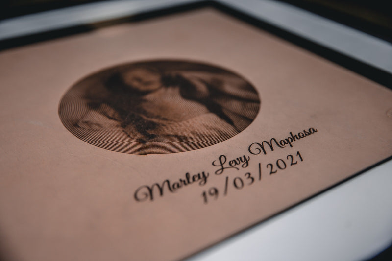 personalised photo frame showing a picture of a baby and the date they were born